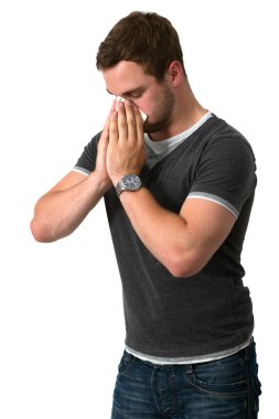 Young Man Blowing Nose clipart