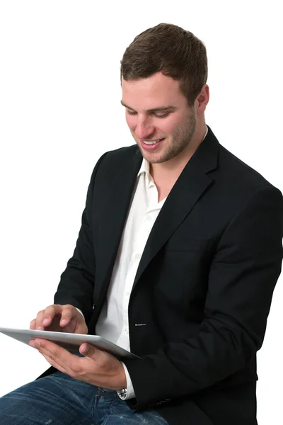 Młody biznesmen pracy na komputerze typu tablet — Zdjęcie stockowe