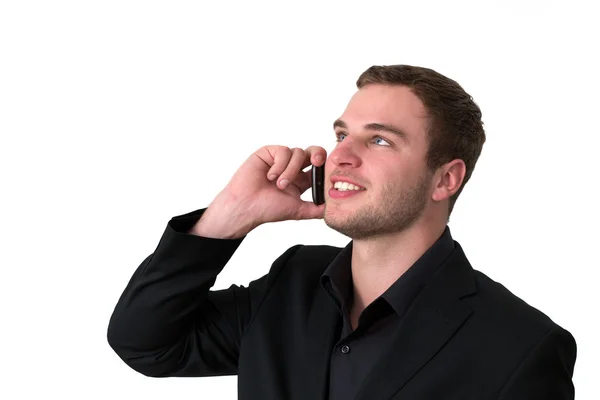 Fiatal férfi kabát beszél a telefonon — Stock Fotó