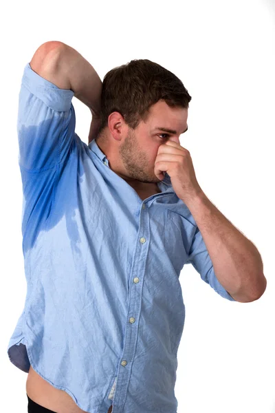 Homem suando muito mal sob axila — Fotografia de Stock