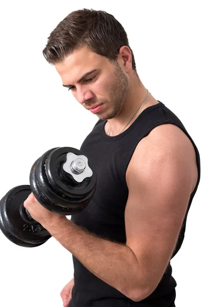 Attractive Young man working out with weights Royalty Free Stock Images