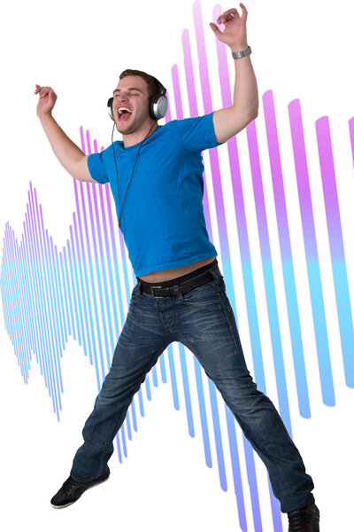 Young Man Listening to music and jumping