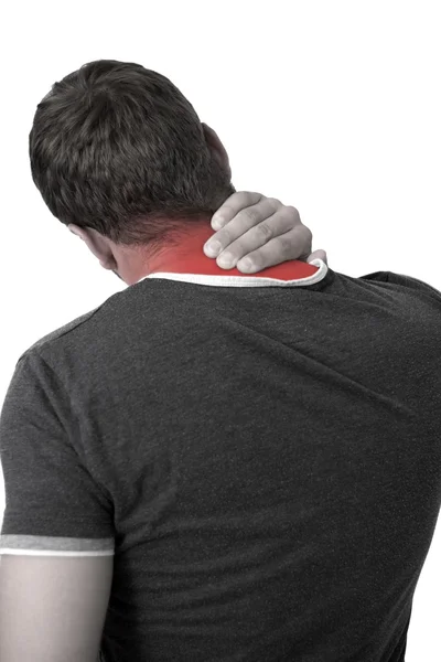 Молодой человек с болью в шее — стоковое фото
