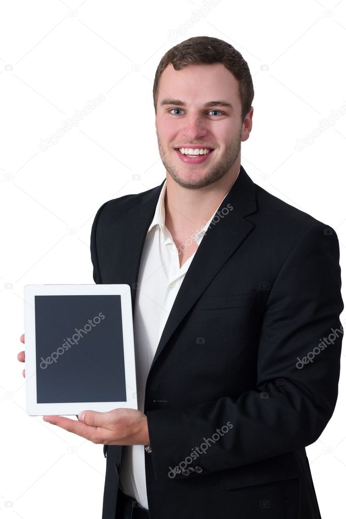 Young man in suit holding tablet pc
