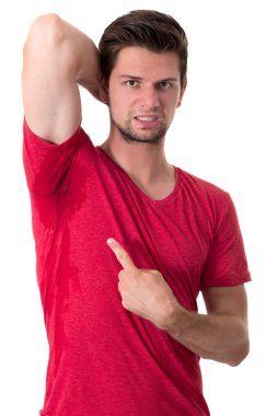 Man sweating very badly under armpit and pointing there clipart