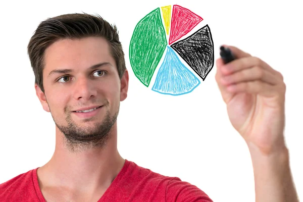 Young man drawing a pie chart — Stock Photo, Image