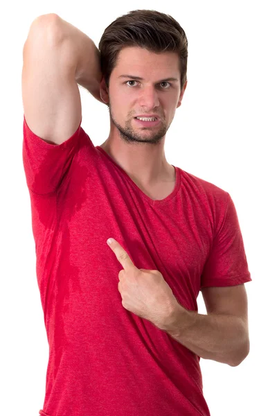 Man sweating very badly under armpit and pointing there — Stock Photo, Image