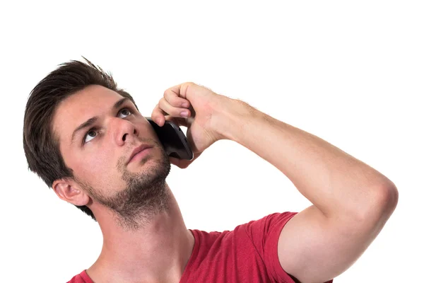 Молодий чоловік розмовляє по телефону — стокове фото