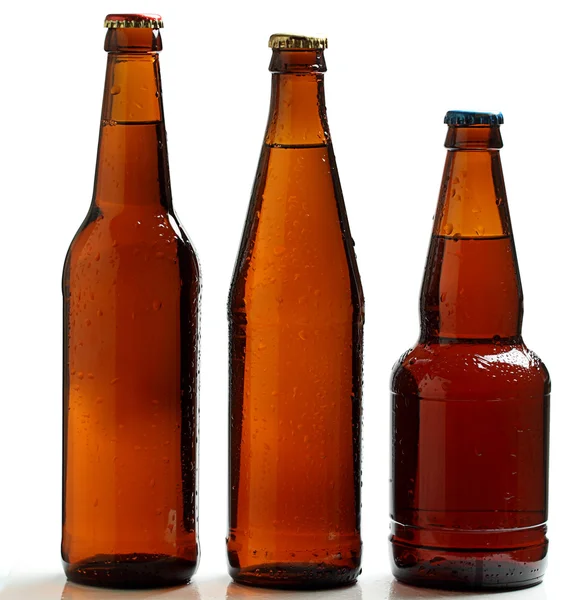 Tre bottiglie di birra refrigerata . — Foto Stock