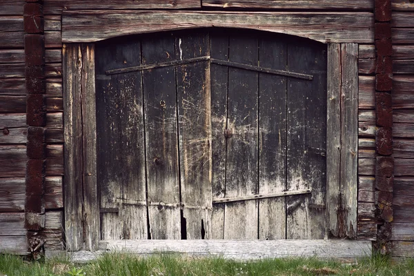 Oude zwarte houten deur — Stockfoto