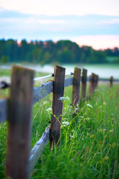 Wooden fence with fog — Stock Photo, Image