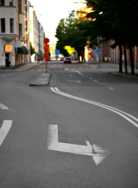 Pijl teken op straat — Stockfoto