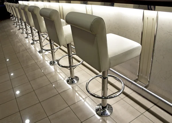 Row of bar stools — Stock Photo, Image