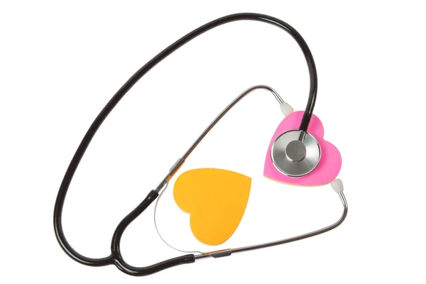 Kalp ve stetoskop. Beyaz bir arka plan üzerinde. — Stok fotoğraf