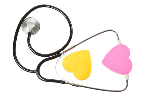 Två hjärtan och stetoskop. på en vit bakgrund. — Stockfoto