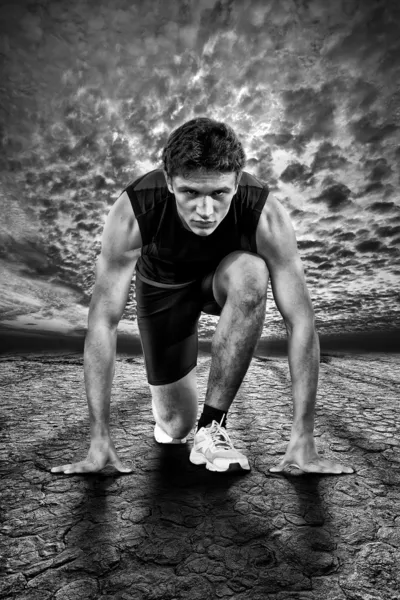 Creative photo of athletes at the start. Black and white. — Stock Photo, Image