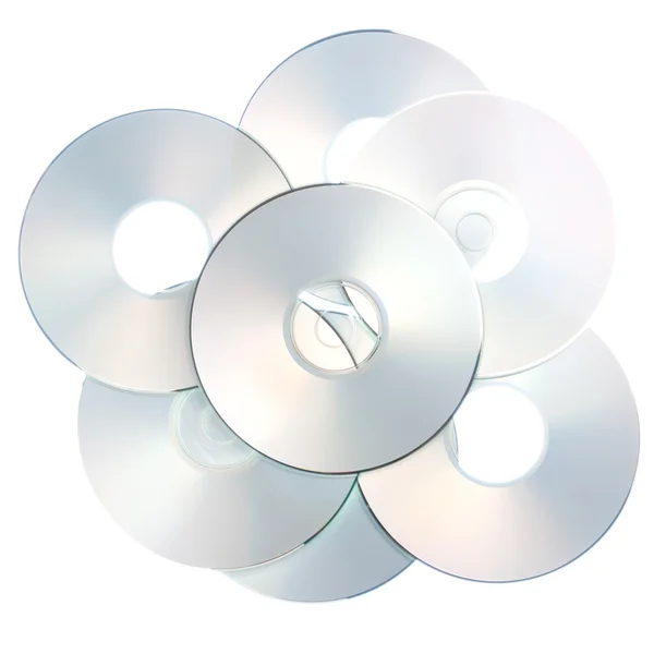 Compacto closeup de discos óticos em um fundo branco. — Fotografia de Stock