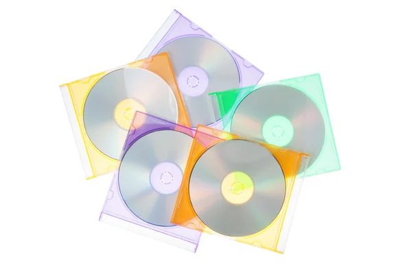 O grupo de discos de cd-dvd nas caixas. sobre um fundo branco. — Fotografia de Stock