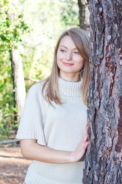 stock image Portrait of a girl on a background of nature.