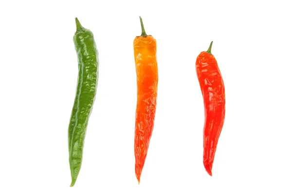 Drei Pfeffer Paprika bunt, auf weißem Hintergrund. — Stockfoto