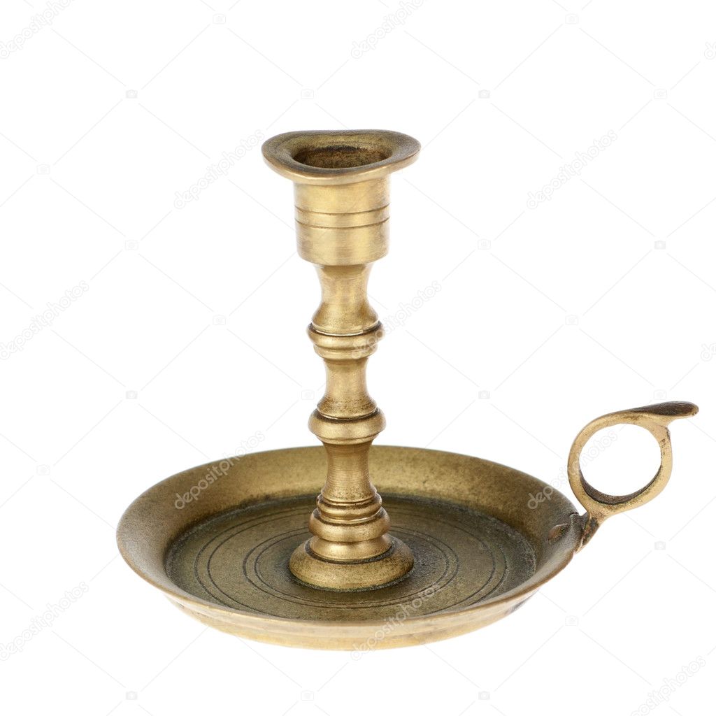 The old brass candlestick on a white background.