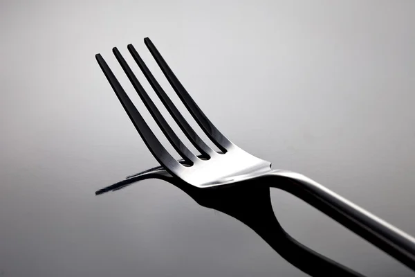 Ezüst villát asztali nyomdák evőeszközök fekete — Stock Fotó