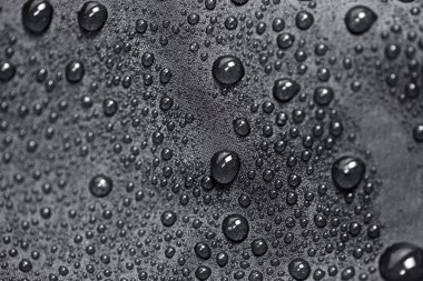 siyah Tekstil Lotus efekti ile su damlaları