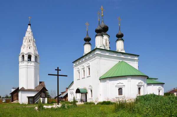 The bell tower and the church of Alexandrovskiy monastery in Suzdal in summer.