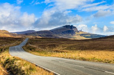 Highway through a desolate landscape clipart