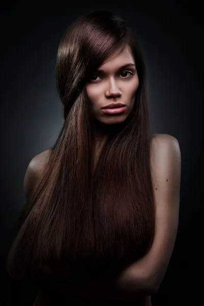 Красивая женщина с длинными волосами Стоковое Изображение