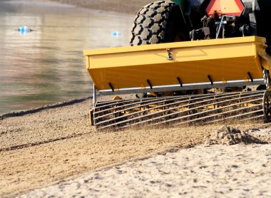 Sand Grader At Public Beach clipart