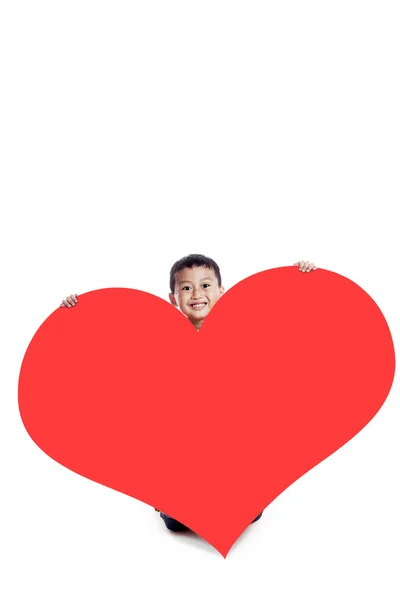 Dreng med et stort hjerte udskæring - Stock-foto