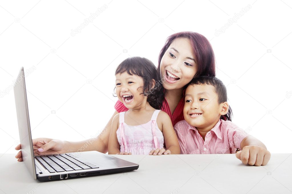 Happy family surfing internet
