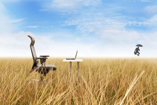 Outdoor office in a golden grass with success businessman jumping leaving his remote office — Stock Photo, Image