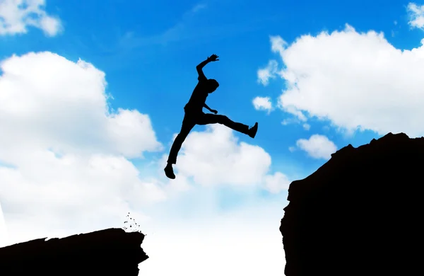 Silhouette of man jumping — Stock Photo, Image