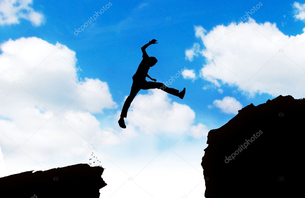 Silhouette of man jumping