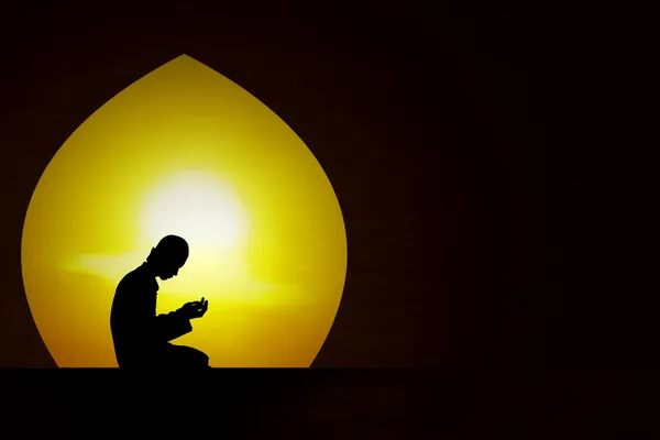 Praying at sunset — Stock Photo, Image