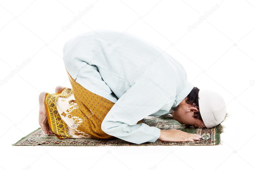 Muslim man prostrating in praying