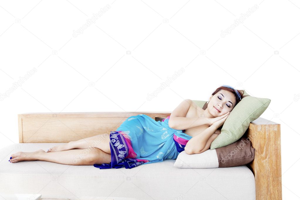 Woman napping on sofa