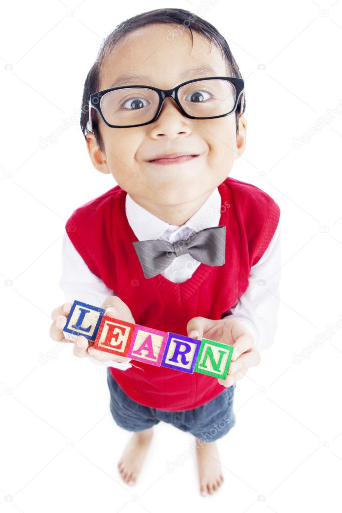 Closeup of schoolboy with LEARN word