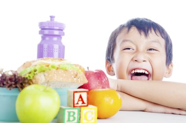 Happy child with school lunch clipart