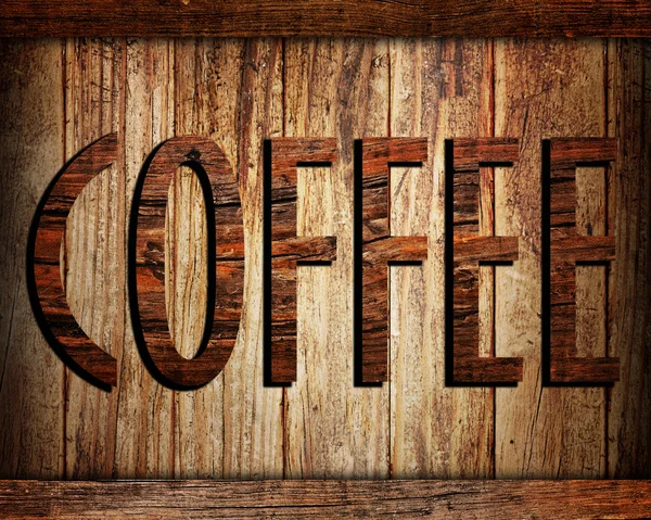 Текст кофе на деревянном фоне — стоковое фото