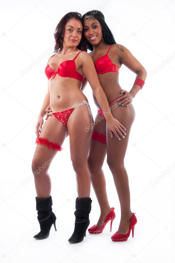 Two women together in red lingerie