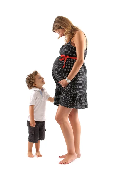 Беременная женщина и ее сын — стоковое фото
