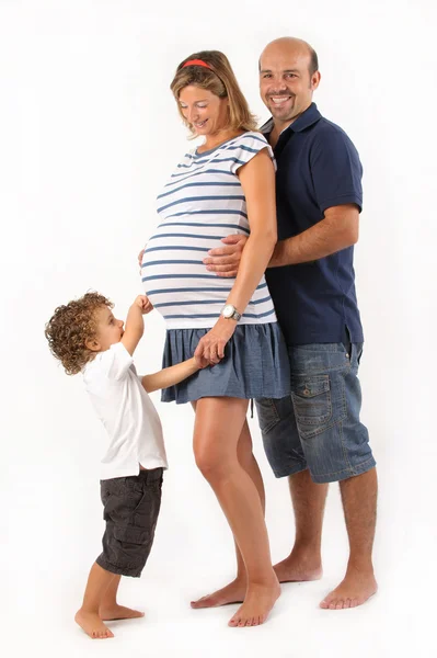 Pregnanto žena s manželem a synem — Stock fotografie
