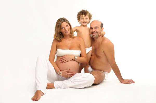 Família feliz com mulher grávida — Fotografia de Stock
