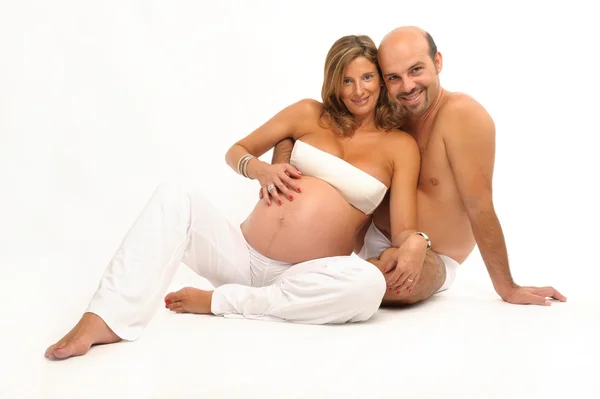 Pareja feliz con la mujer embarazada —  Fotos de Stock