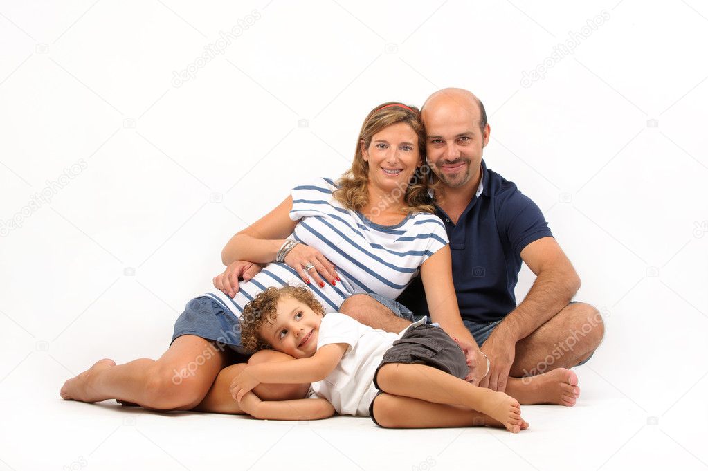 Happy family together with pregnant woman