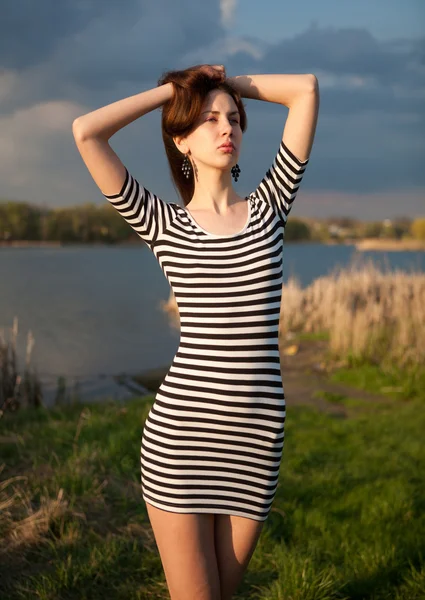 The girl in a striped T-shirt — Stock Photo, Image