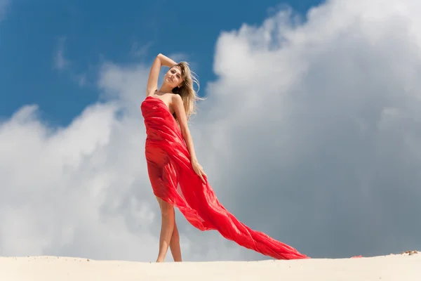 The beautiful girl against clouds — Stock Photo, Image